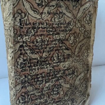 Special bindings decorated paper binding with printed songtext. Cartouche
