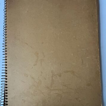 Two ring binders full of newspaper articles of criminality cases in The Netherlands