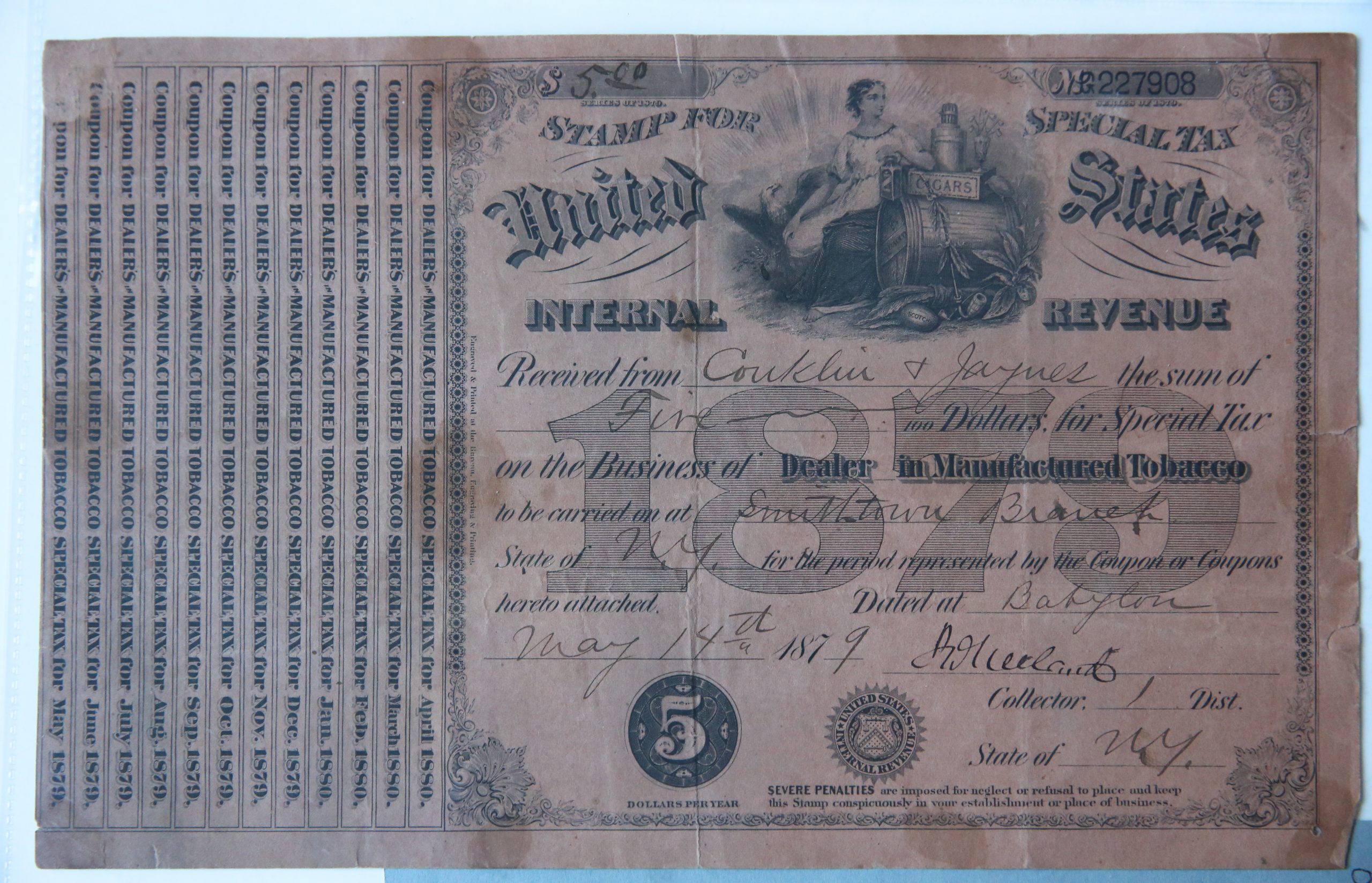 Stamp for special tax United States Internal Revue received from (...) on the business of dealer in Manufactured Tobacco dated Babylon, May 14th 1879, state of NY.