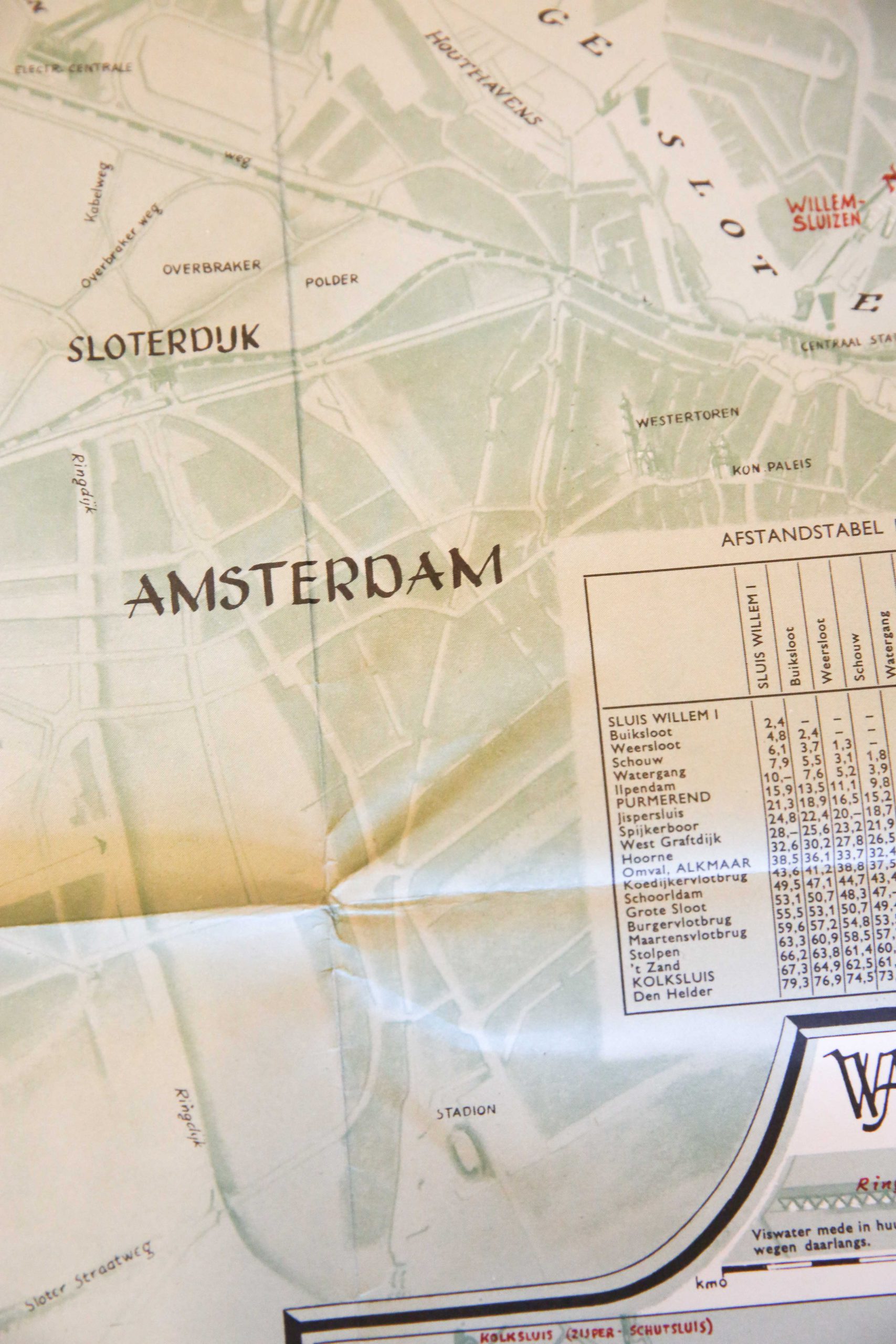 FIRST EDITION: Cartography/maps: Waterkaart van Hengelsport Vereniging Haarlem, Uitgave van Hengelsportvereniging "Haarlem", secretariaat: Rollandstraat 36 Haarlem. Ontwerp en tekening: Adv. Bur. v. Cartografische Vormgeving, F.W. Michels Amsterdam. Letters: G.C. v. Norden, Loosdrecht. Druk: Mouton & Co, den Haag, EERSTE DRUK: 1958. Copyrights: H.V.H. en A.C.V. Michels. 102 x 79 cm.