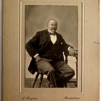 Portrait photograph of K. de Vos, postdirecteur. 1900.