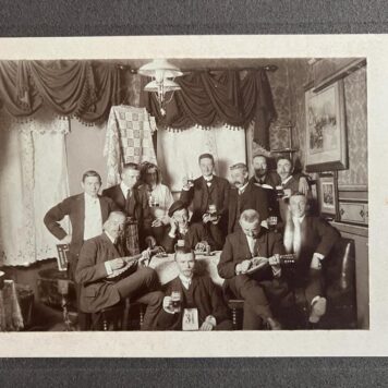 Photo of group of men with music and drinks in Mittweida Saksen Germany 1905.