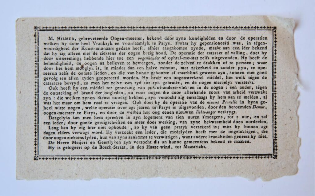 Reclamepamfletje van de gebreveteerde oogen-meester M. Hilmer, die zijn komst te Maastricht meldt (in logement de Haaze-wind in de Bosstraat). 8° oblong, 1 p, gedrukt, met sierrandje. Waarschijnlijk 18e-eeuws.