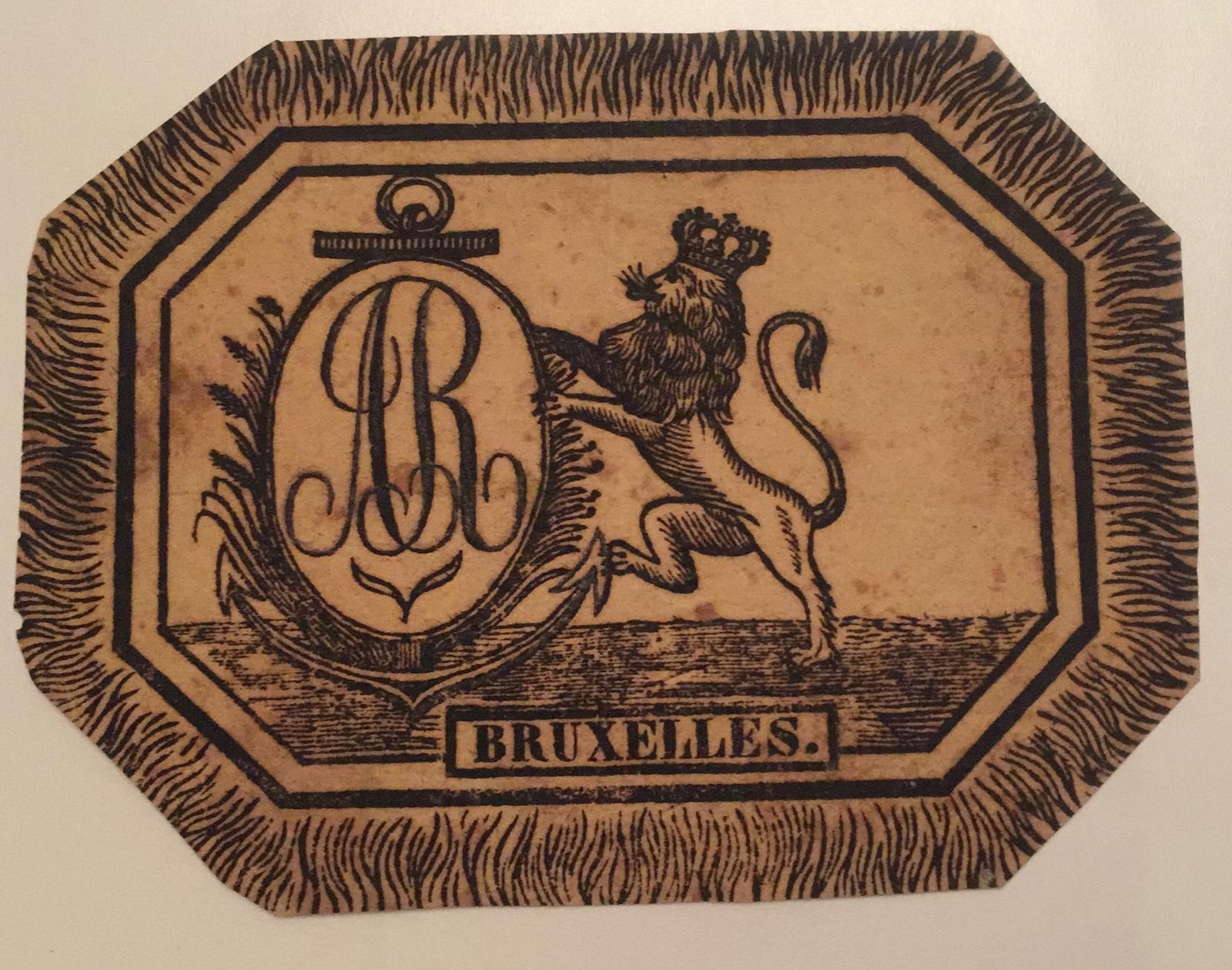 [Vignet] - Vignet with Bruxelles printed in the text underneath a lion holding an oval with the letters A.R., 1 p.